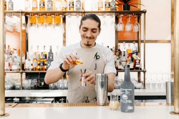 Bartender making a cocktail using Casamigos